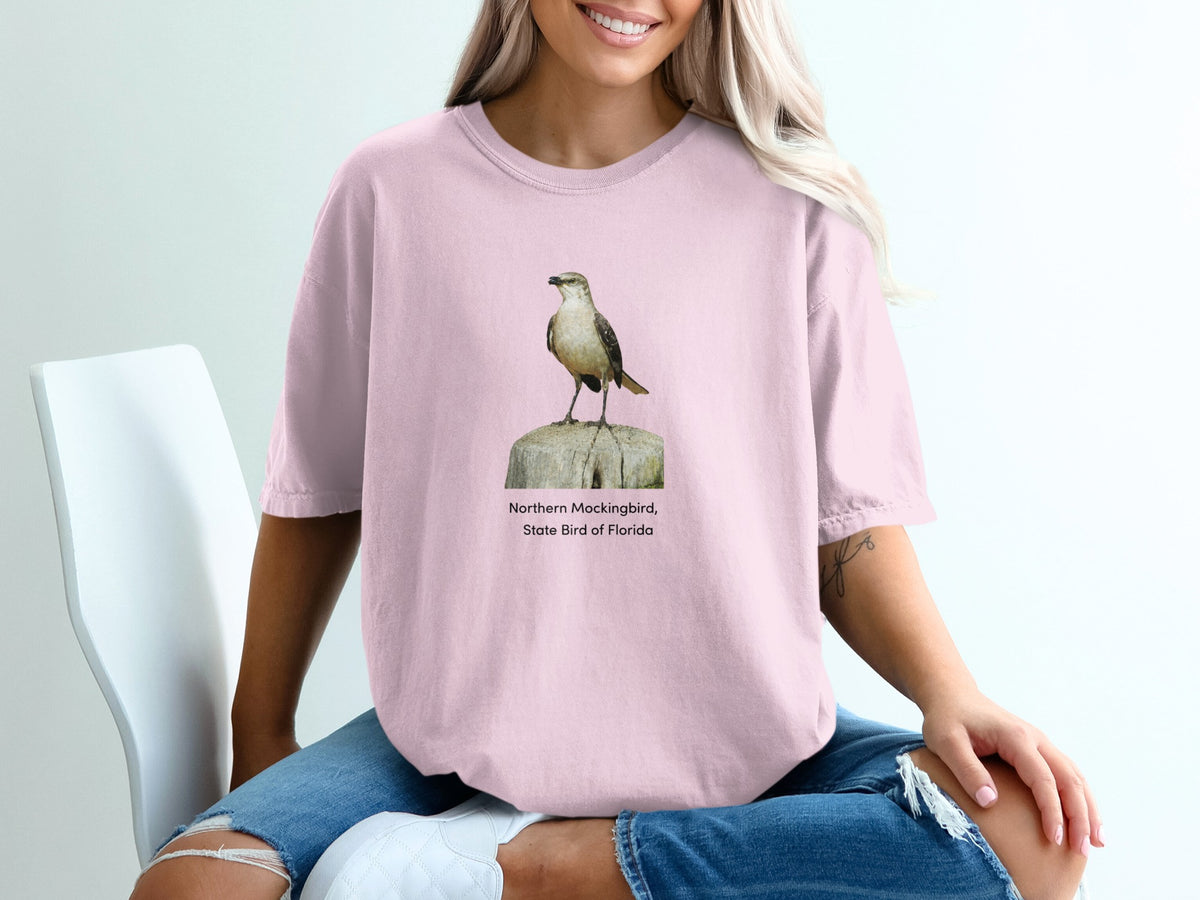 Pink t-shirt with a Northern Mockingbird, State Bird of Florida graphic.