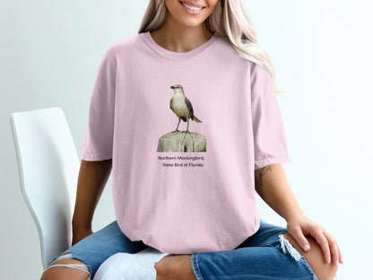 Pink t-shirt with a Northern Mockingbird, State Bird of Florida graphic.