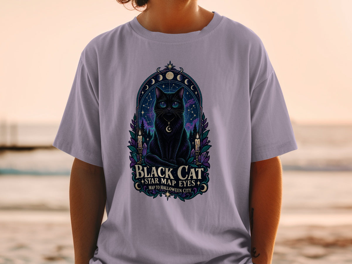 Black cat with starry eyes on t-shirt with text: Black Cat, Star Map Eyes, Map to Halloween City.