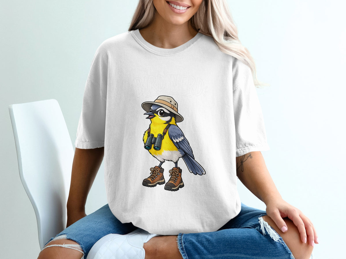 White t-shirt with cartoon bird wearing hat, binoculars, and hiking boots.