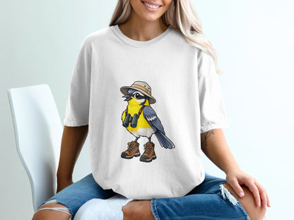 White t-shirt with cartoon bird wearing hat, binoculars, and hiking boots.