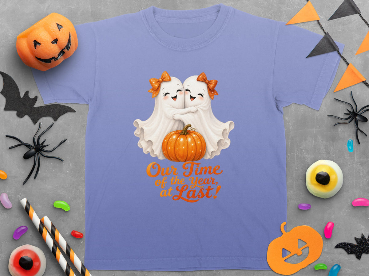 Purple t-shirt with two ghosts hugging a pumpkin and text "Our Time of the Year, at Last!"
