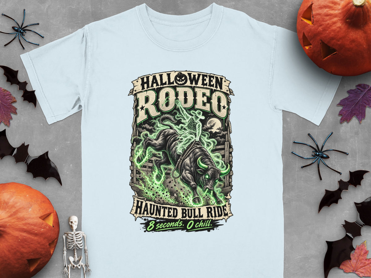 Light blue t-shirt with Halloween Rodeo Haunted Bull Ride graphic.