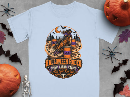 Light blue t-shirt with Halloween Rodeo spooky barrel racing graphic.