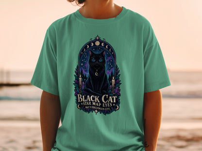 Black cat with starry eyes and text "Black Cat Star Map Eyes Map to Halloween City."