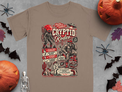 Cryptid Rodeo t-shirt design with Bigfoot, Mothman, Chupacabra, Jackalope, and UFO.