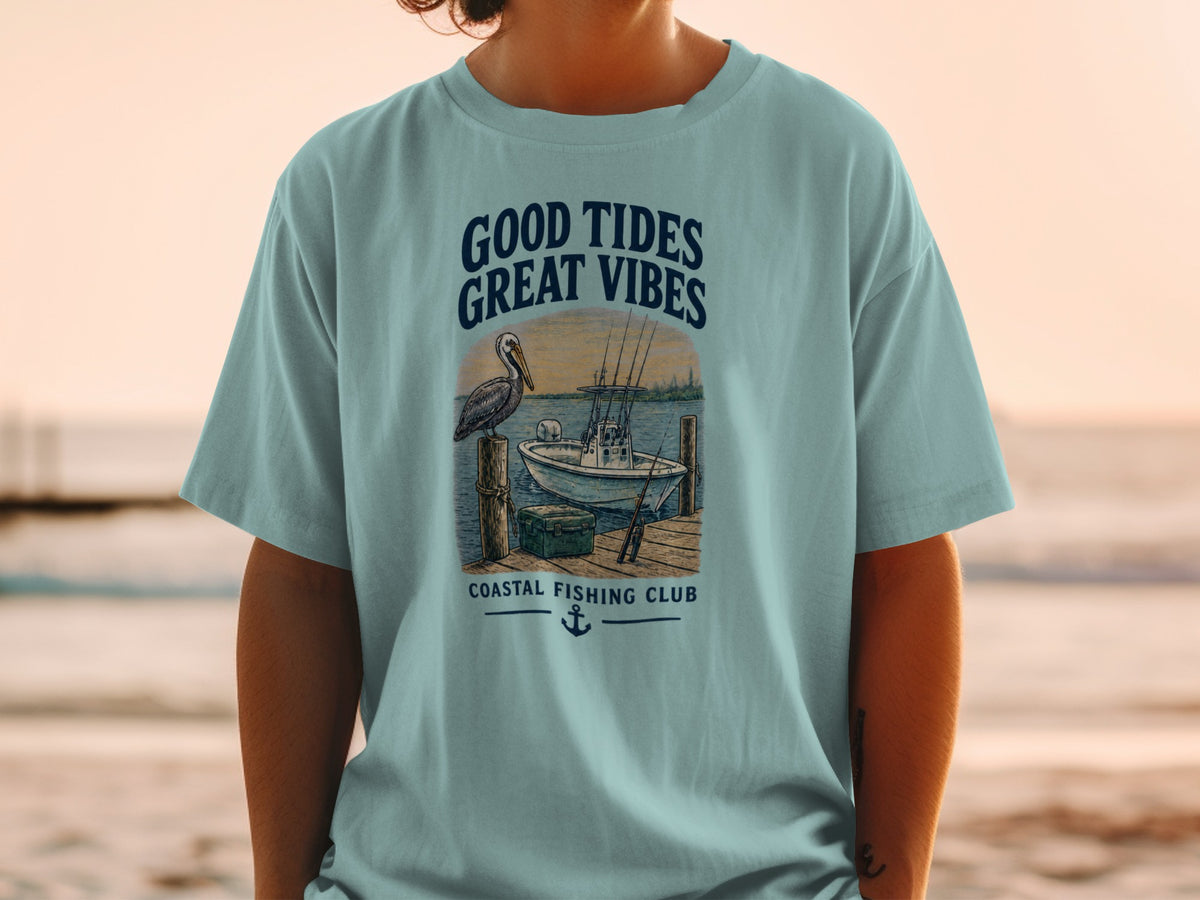 T-shirt graphic with "Good Tides Great Vibes" and fishing boat scene.