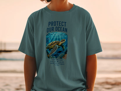 T-shirt with "Protect Our Ocean" text and sea turtle graphic.