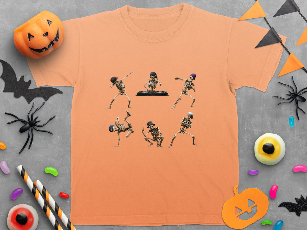 Orange t-shirt with six dancing skeleton graphics and Halloween decorations.
