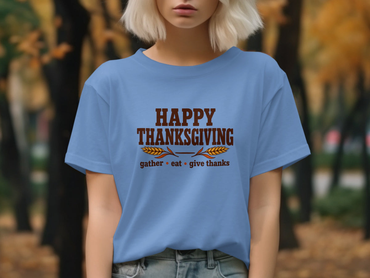 Light blue t-shirt with "Happy Thanksgiving" text and "gather eat give thanks".