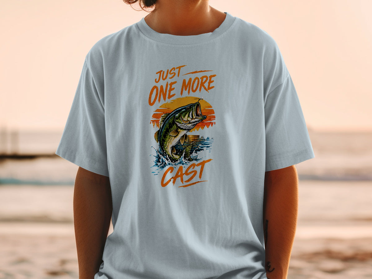 Light blue t-shirt with jumping bass graphic and text "JUST ONE MORE CAST".