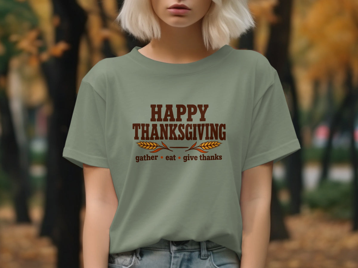 Olive green t-shirt with "Happy Thanksgiving gather eat give thanks" text.