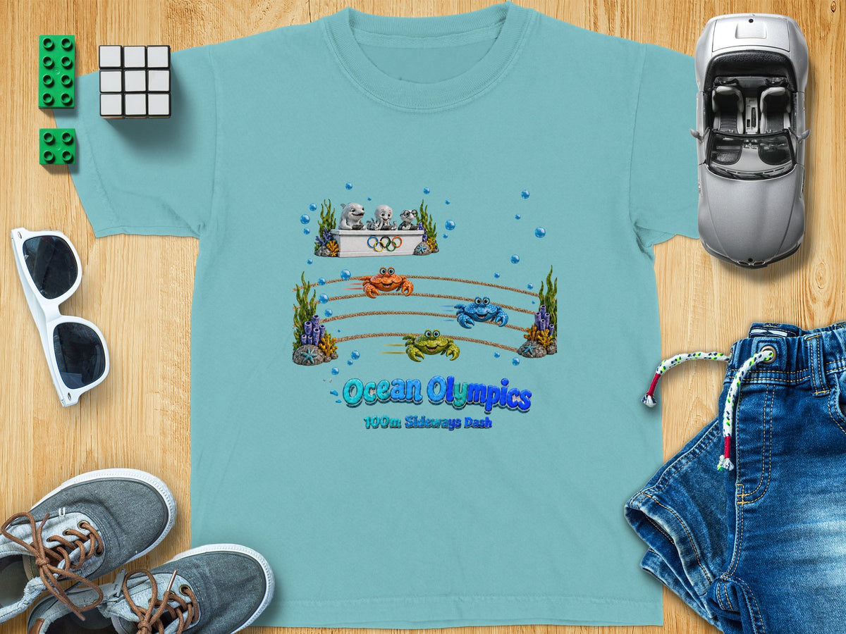 Aqua t-shirt with "Ocean Olympics 100m Sideways Dash" featuring cartoon sea creatures.