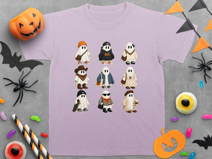Light purple t-shirt with nine cartoon ghosts in Halloween costumes and "BOO." text.