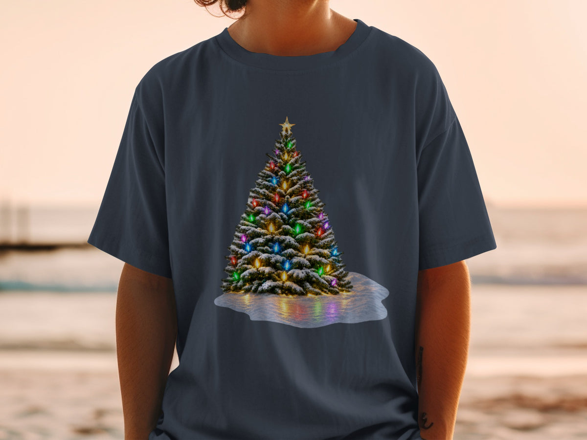 Snow-covered Christmas tree with colorful lights on a dark t-shirt.