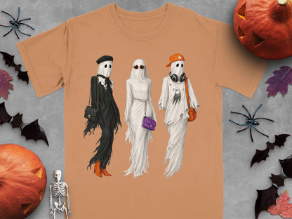 Three ghosts in stylish Halloween outfits with accessories.
