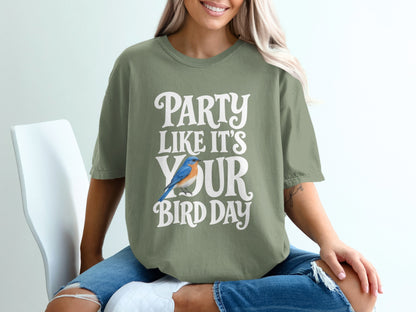 Olive green shirt with white text and a blue bird: "PARTY LIKE IT'S YOUR BIRD DAY"