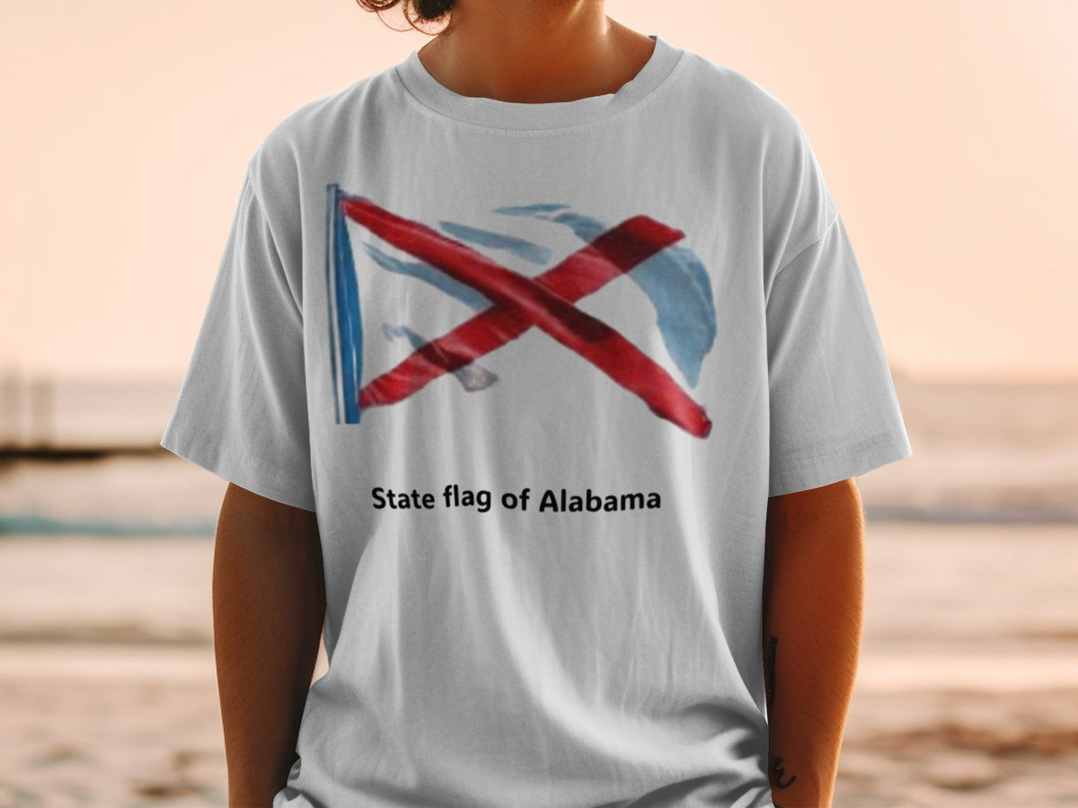 White t-shirt featuring the state flag of Alabama artwork and text.