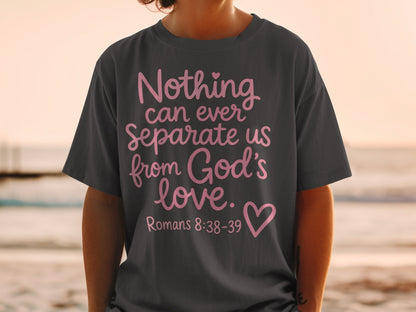 Dark grey t-shirt with pink text "Nothing can ever Separate us from God's love. Romans 8:38-39"