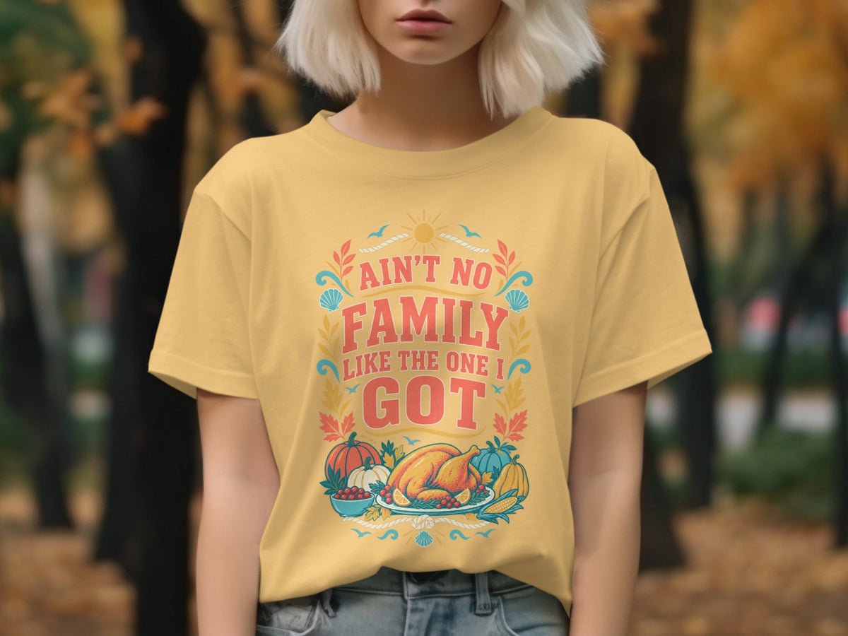 Yellow t-shirt with "Ain't No Family Like The One I Got" text and Thanksgiving graphics.