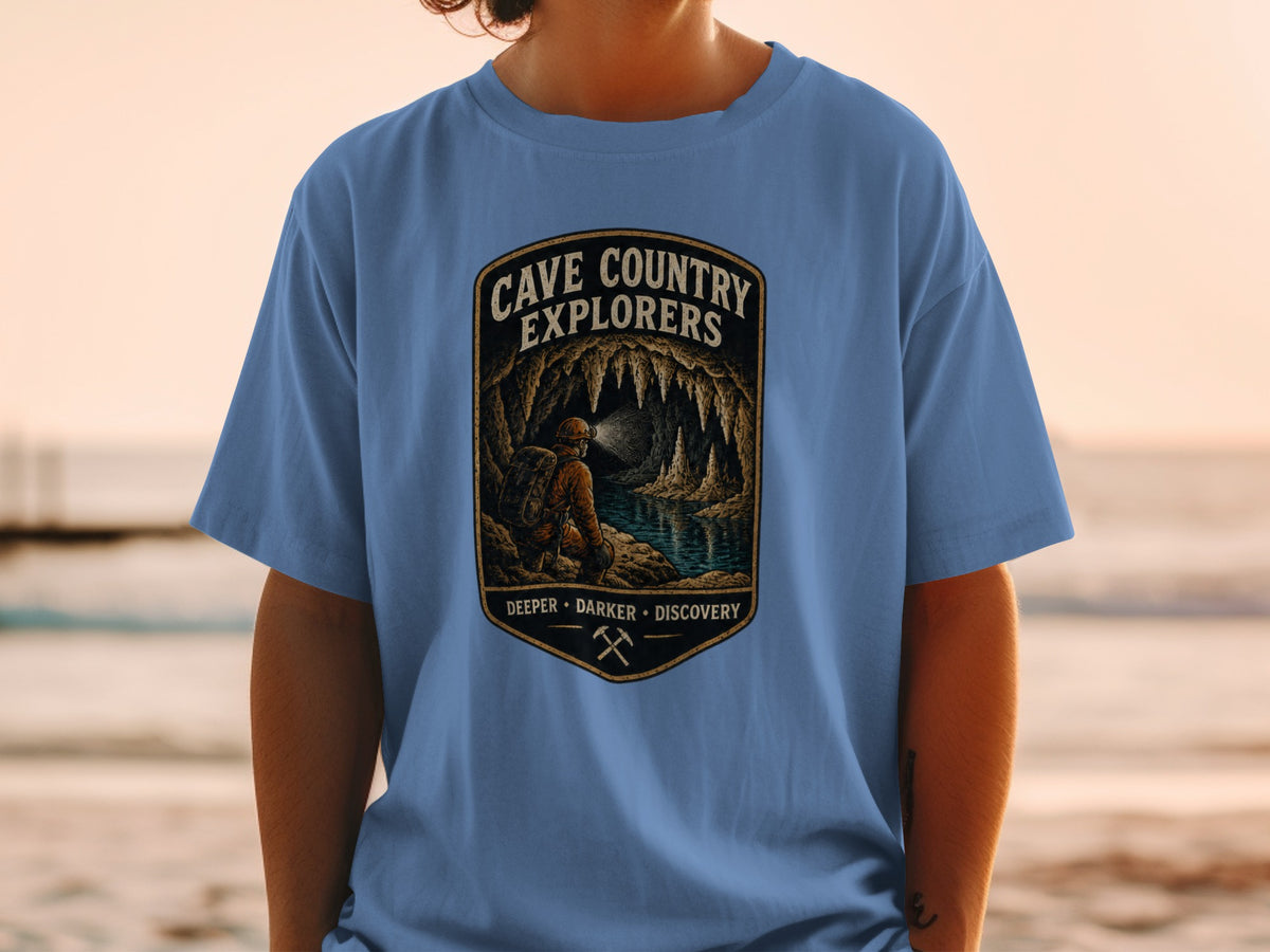 Cave Country Explorers t-shirt with cave scene and explorer, "Deeper Darker Discovery."
