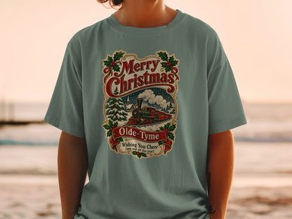 T-shirt graphic: Merry Christmas Olde-Tyme train scene with text.