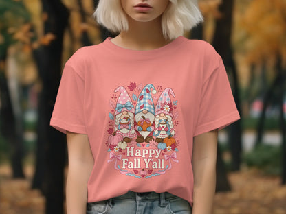 Three gnomes with pumpkins and text "Happy Fall Y'all" on a pink shirt.