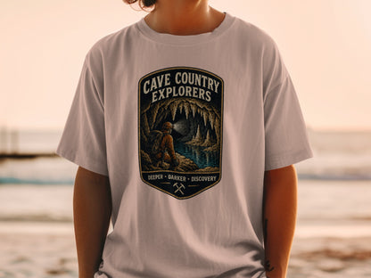 Cave Country Explorers design with caver and text, on a light t-shirt.