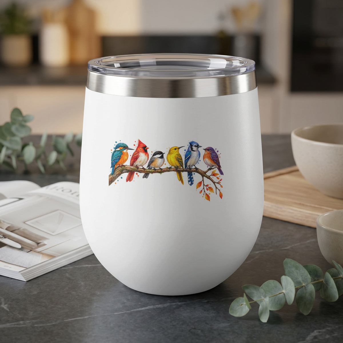 White tumbler with a watercolor illustration of six birds perched on a branch.