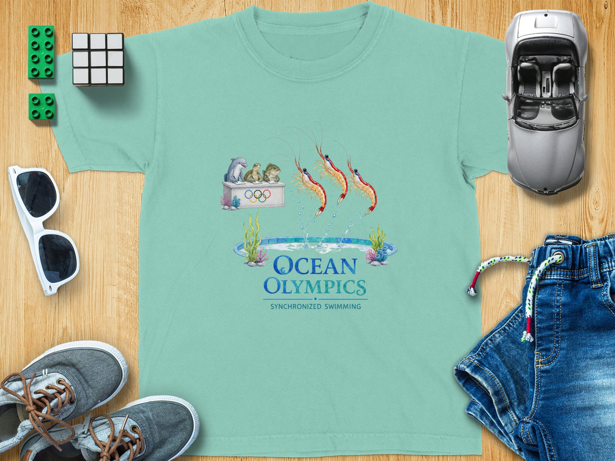 Aqua t-shirt with "Ocean Olympics Synchronized Swimming" and cartoon sea creatures.