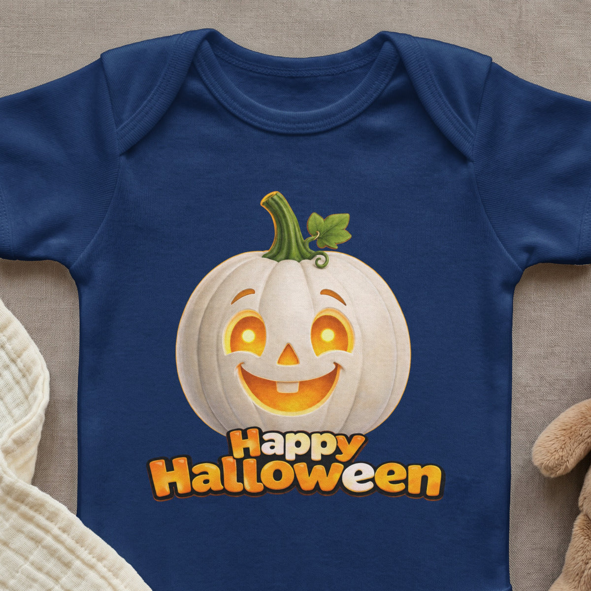 Navy blue baby bodysuit with a smiling white jack-o'-lantern and "Happy Halloween" text.