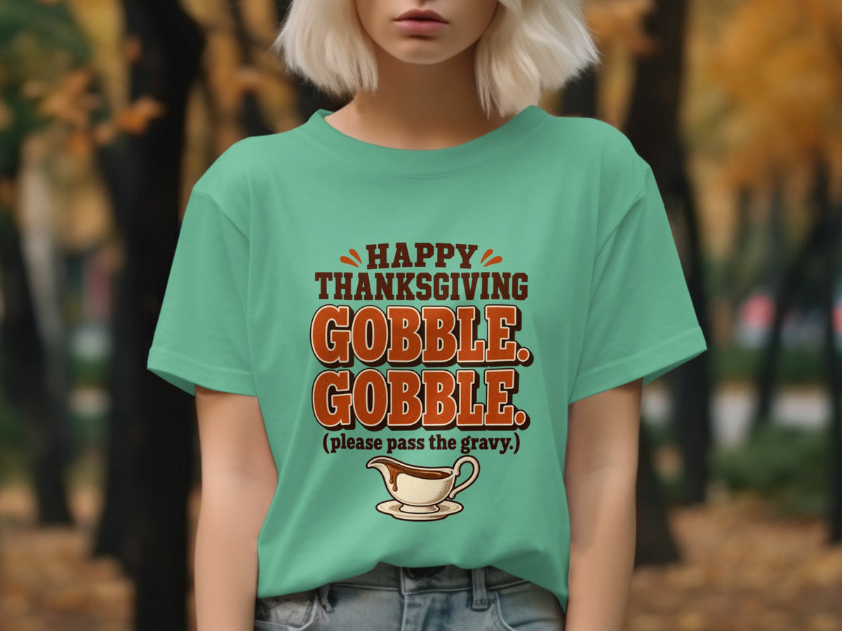 Happy Thanksgiving Gobble Gobble text with gravy boat graphic on shirt.