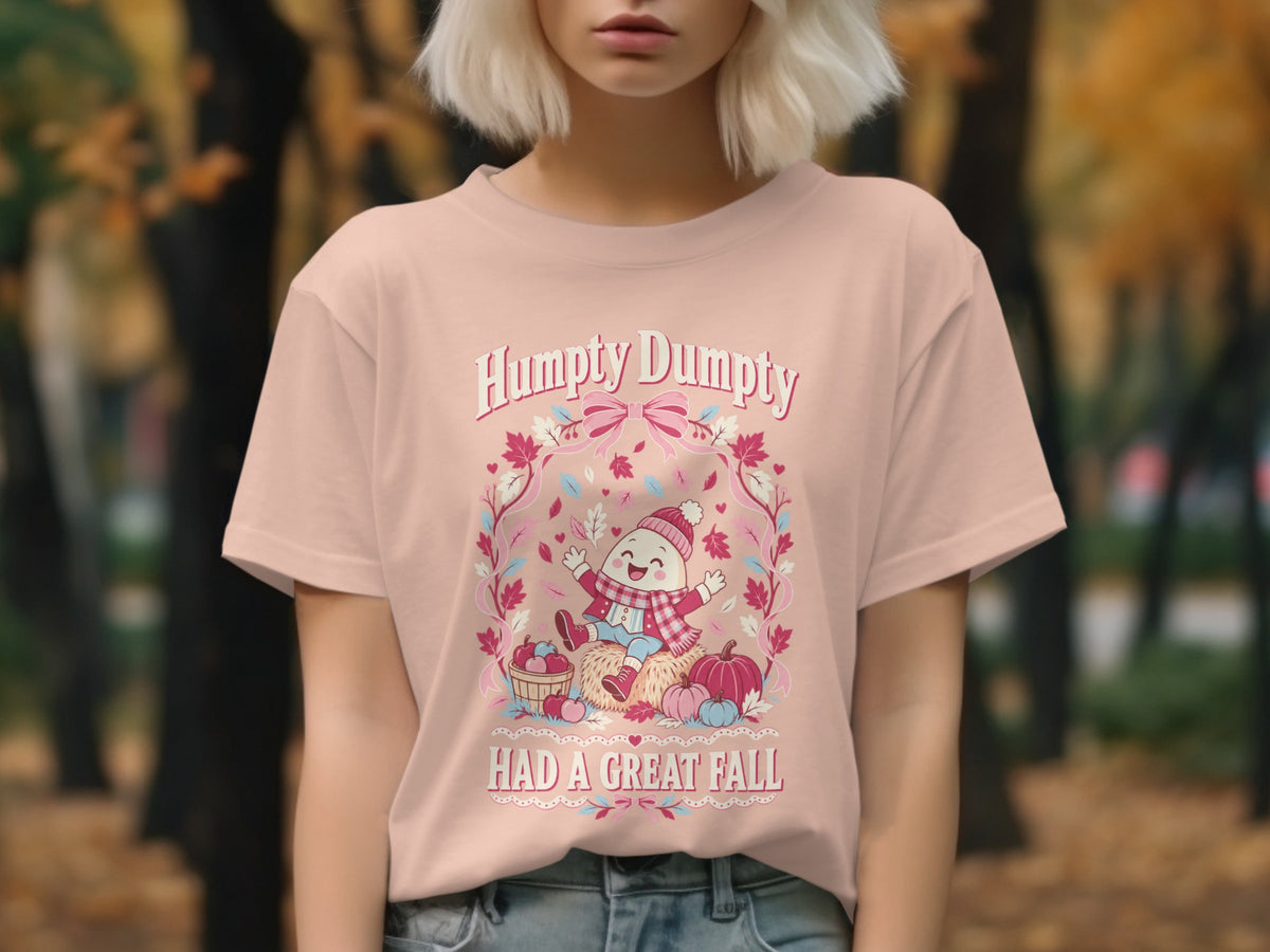 Humpty Dumpty graphic with text "Humpty Dumpty HAD A GREAT FALL" on a pink shirt.