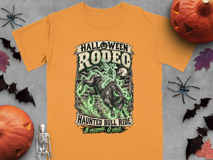 Orange t-shirt with Halloween Rodeo graphic featuring a bull and rider, text "Haunted Bull Ride 8 seconds. 0 chill."