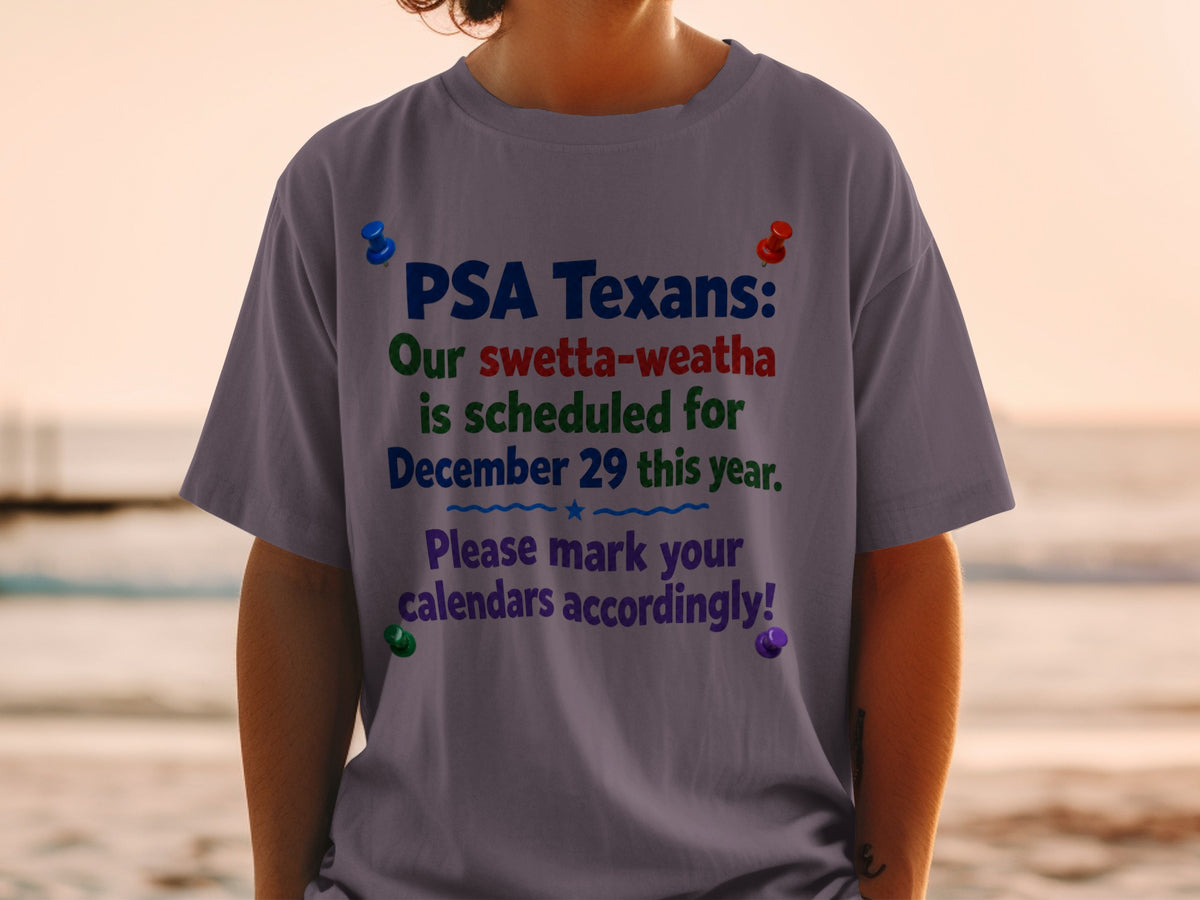 Grey t-shirt with blue, red, green, and purple text announcing "PSA Texans: Our swetta-weatha is scheduled for December 29 this year. Please mark your calendars accordingly!"