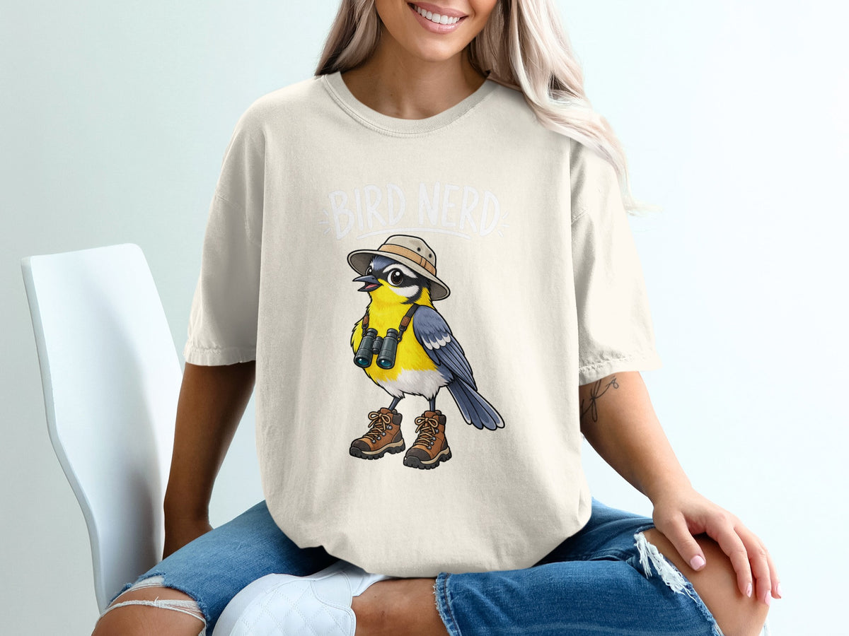 T-shirt with cartoon bird wearing hat, binoculars, and boots, text reads "Bird Nerd".