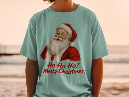 Light blue t-shirt with Santa and text "Ho Ho Ho! Merry Christmas!".