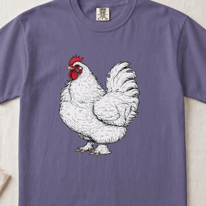 A purple t-shirt featuring an illustration of a fluffy white rooster with a red comb.