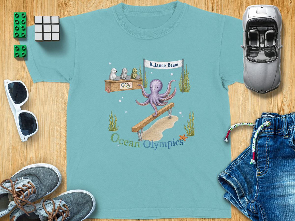 Teal t-shirt with Ocean Olympics design featuring octopus on balance beam.