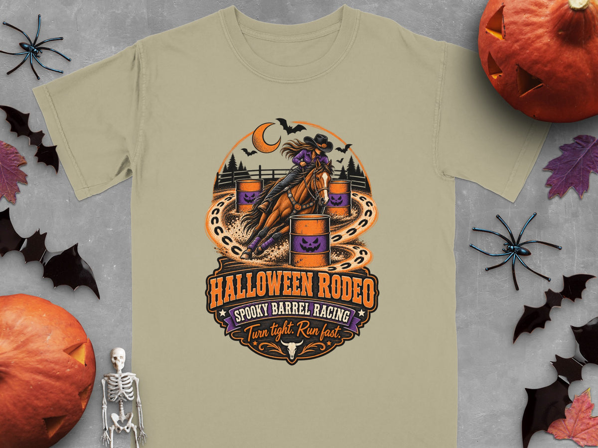 "Halloween Rodeo Spooky Barrel Racing" graphic on a tan t-shirt.