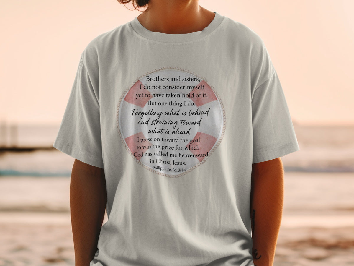 T-shirt with scripture from Philippians 3:13-14 within a life preserver graphic.