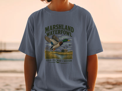 Marshland Waterfowl graphic with flying duck and text Field Flyway Season.