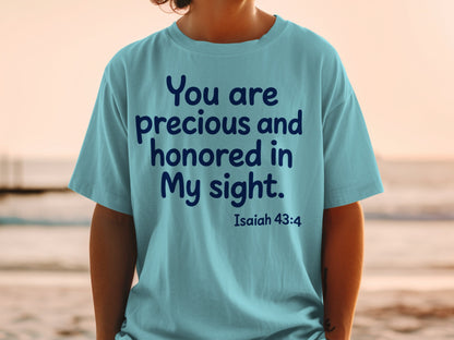 Teal t-shirt with dark blue text "You are precious and honored in My sight. Isaiah 43:4."