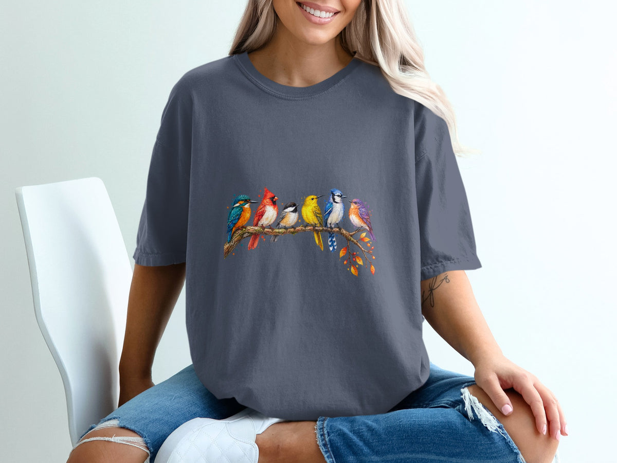 Six colorful birds perched on a branch with autumn leaves.