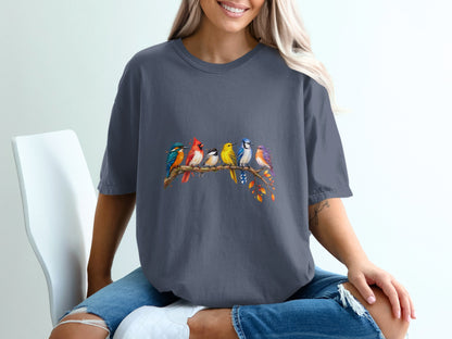 Six colorful birds perched on a branch with autumn leaves.