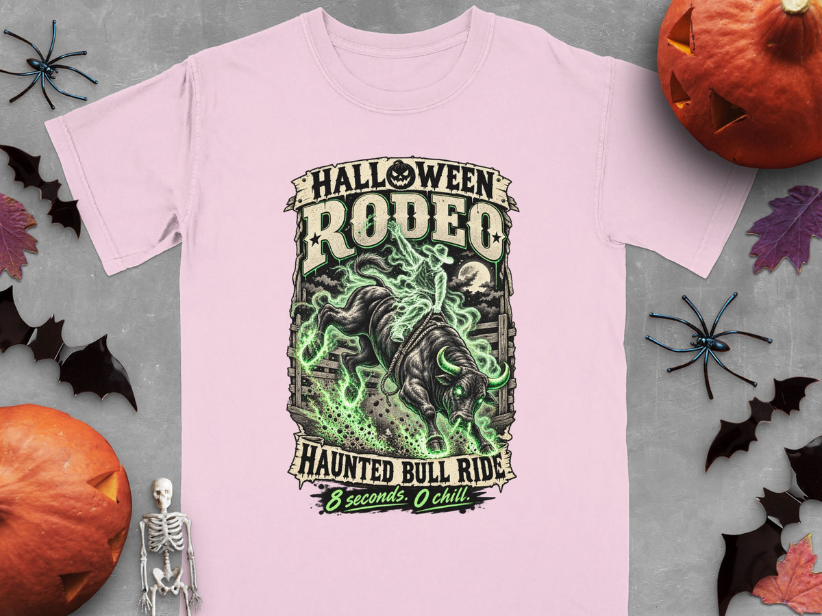 Pink t-shirt with Halloween Rodeo graphic featuring a bull and rider with text.