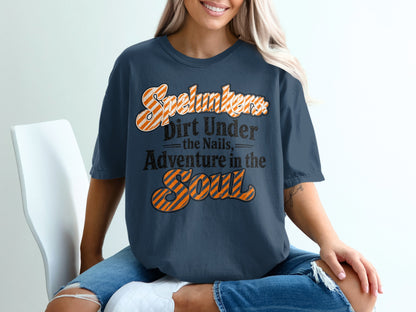 Dark blue t-shirt with text: Spelunkers, Dirt Under the Nails, Adventure in the Soul