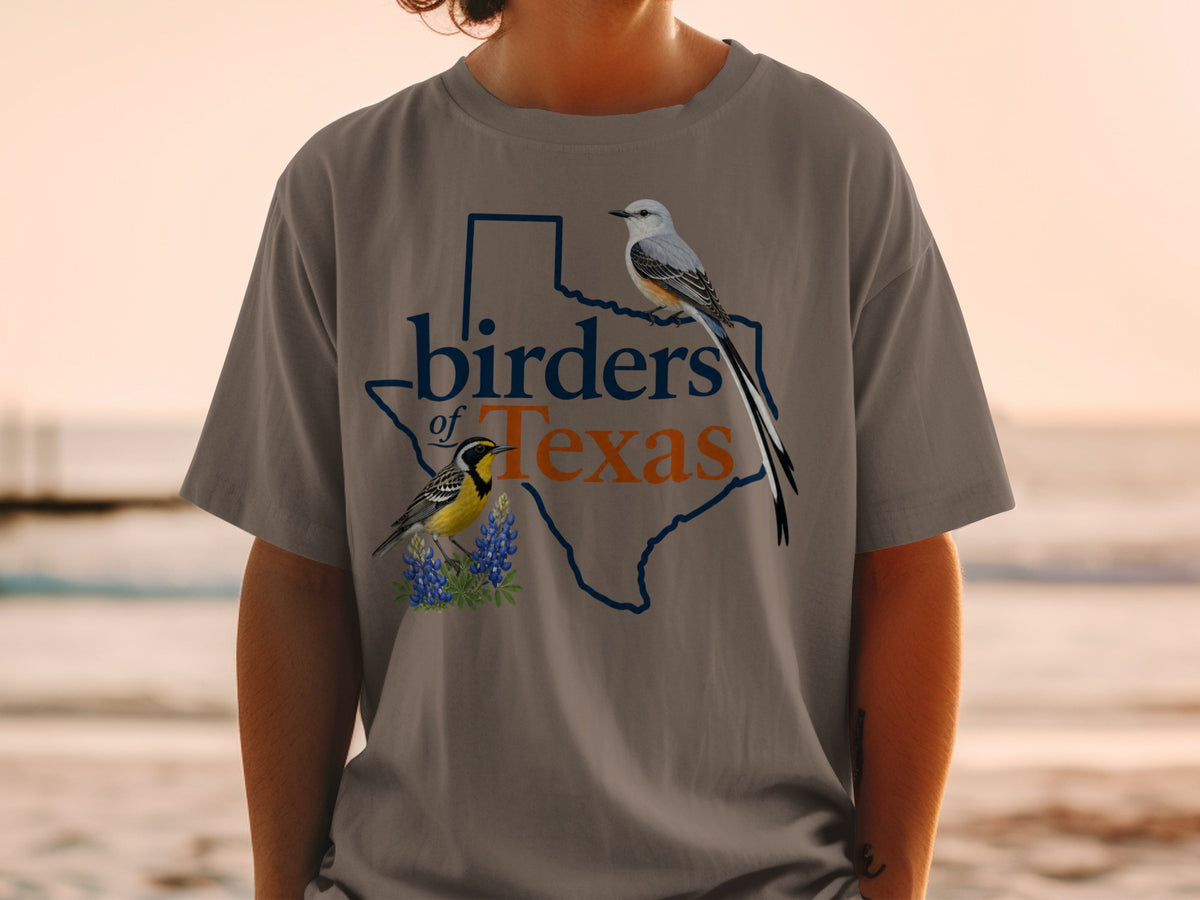 T-shirt graphic: "birders of Texas" map outline, two birds, and bluebonnets.