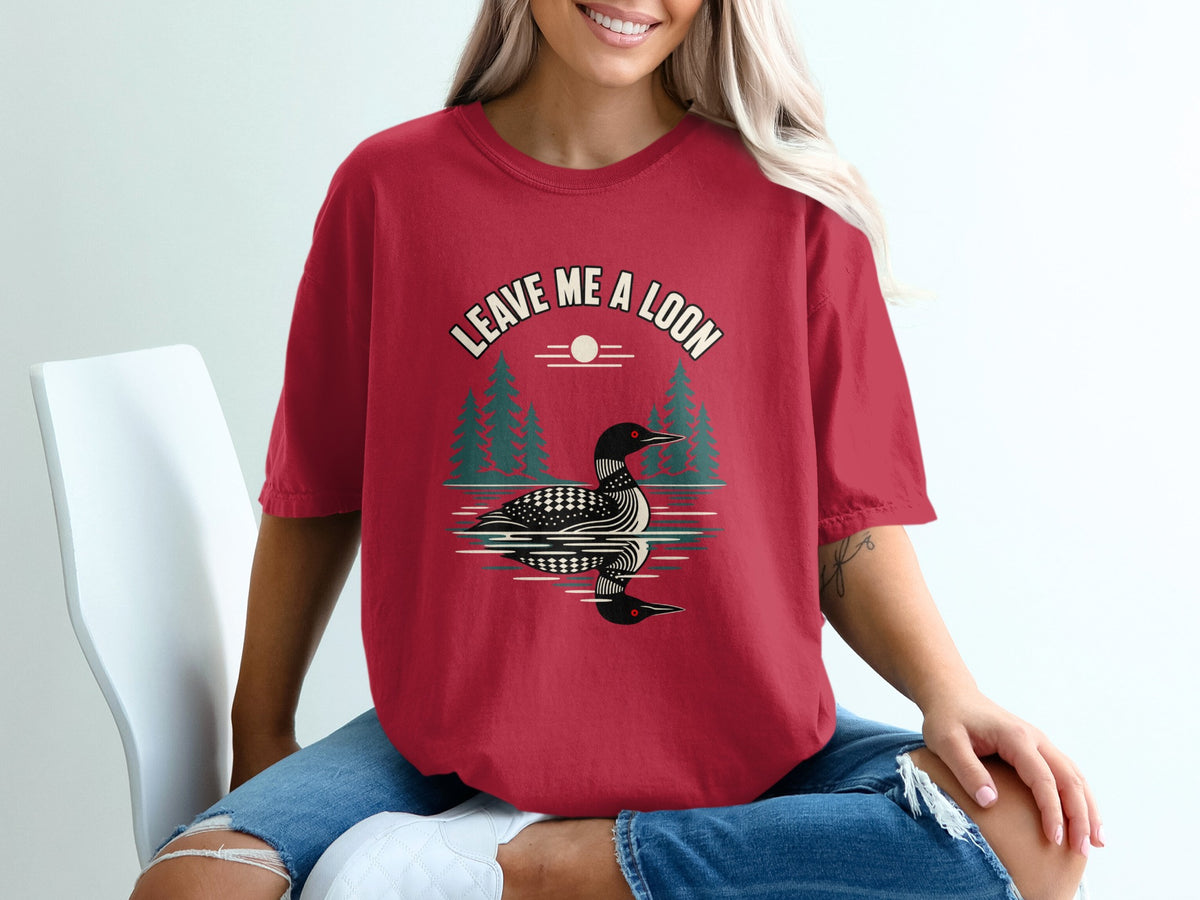 Red t-shirt with "LEAVE ME A LOON" text and loon graphic.