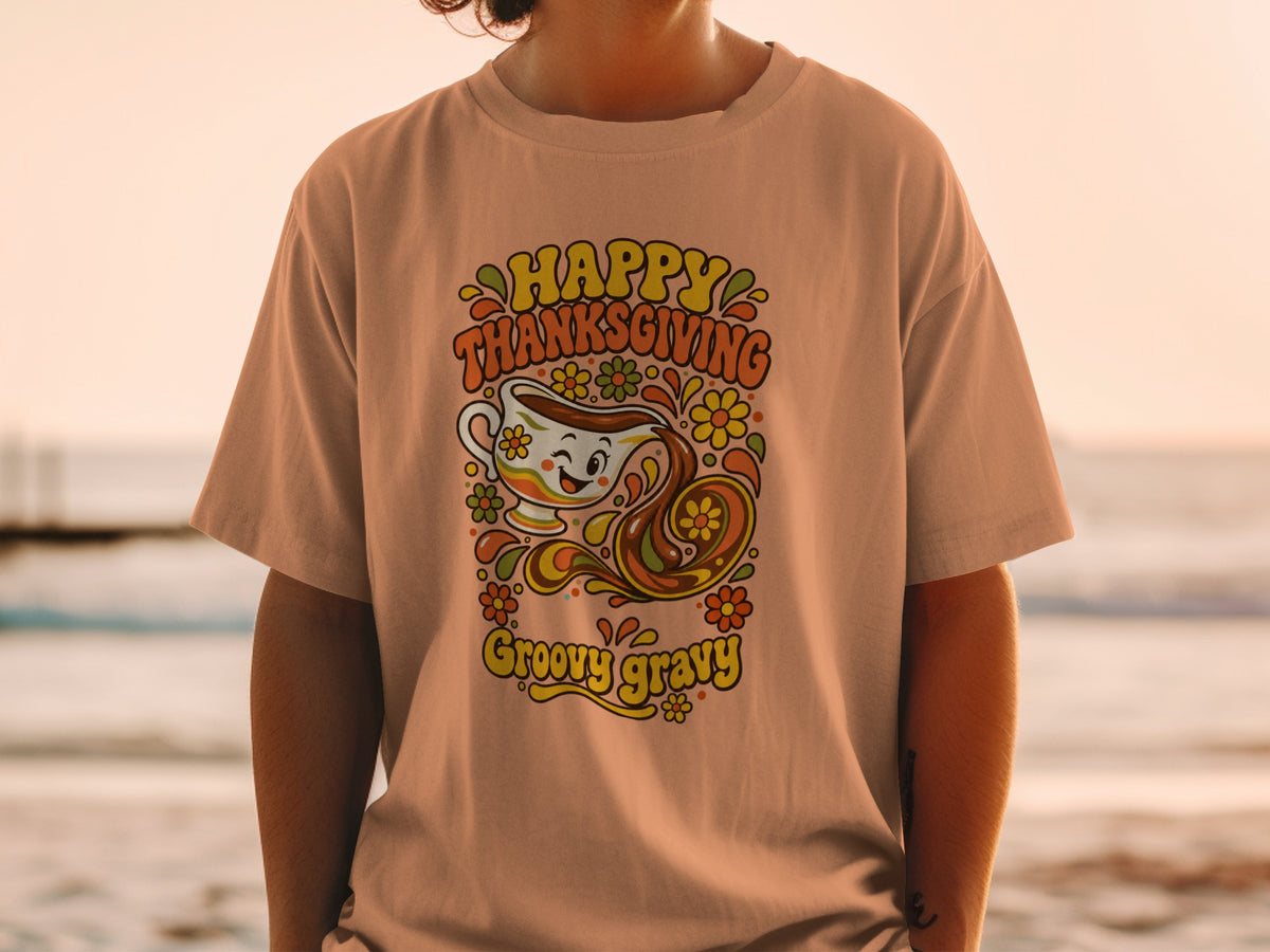 T-shirt with "Happy Thanksgiving Groovy Gravy" text and a smiling gravy boat graphic.
